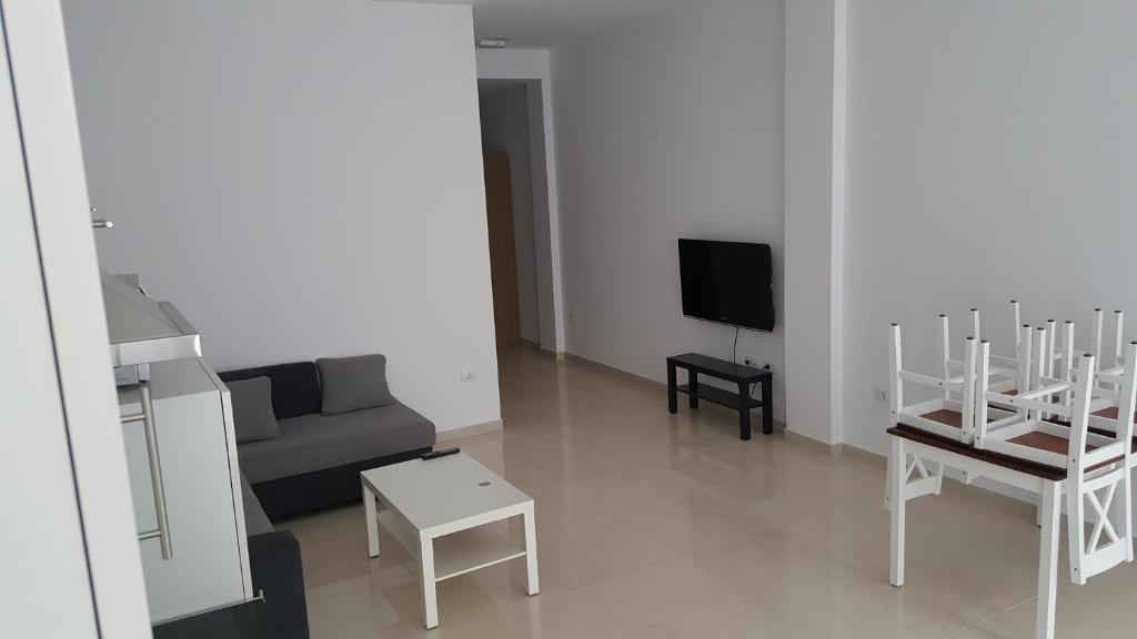 TV a/nebo společenská místnost v ubytování Apartamento Juli4