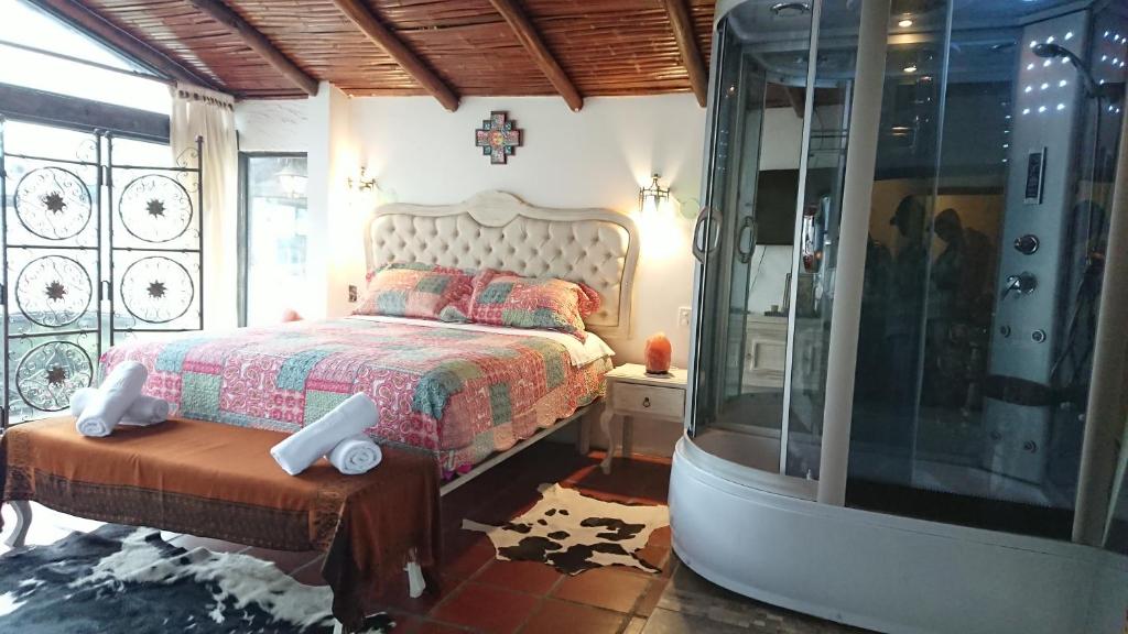 Postel nebo postele na pokoji v ubytování Villa Mimi