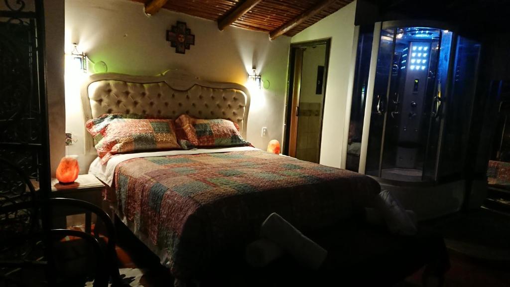 Postel nebo postele na pokoji v ubytování Villa Mimi