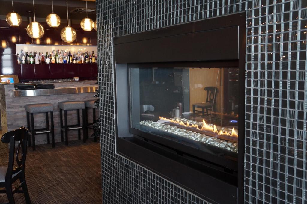 a restaurant with a large oven in the middle of the room at Frantz Inn in Steinbach