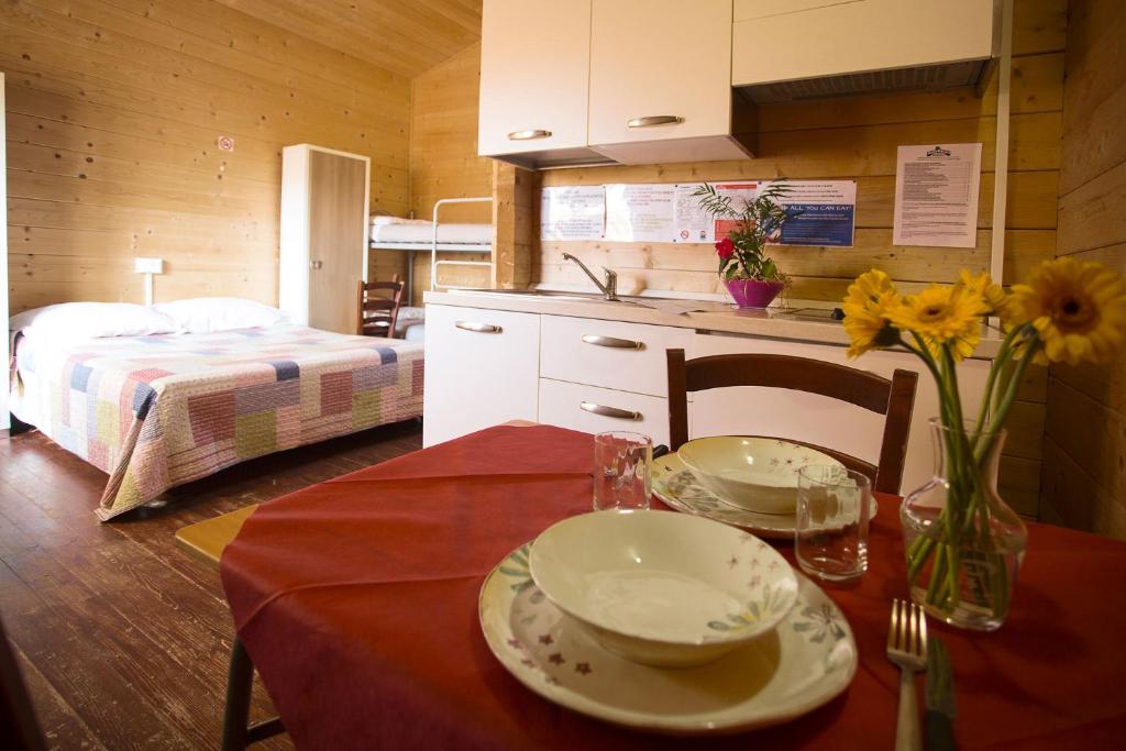Postel nebo postele na pokoji v ubytování Camping Rialto