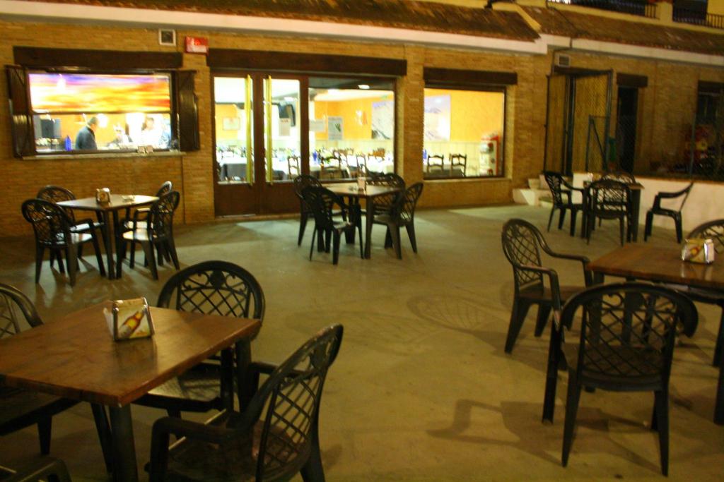 Un restaurante o sitio para comer en Hotel Rural Huerta del Laurel