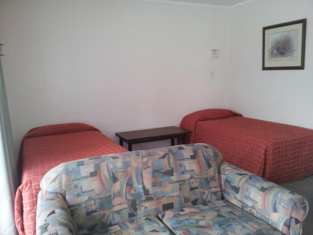 Posezení v ubytování Ace High Motor Inn