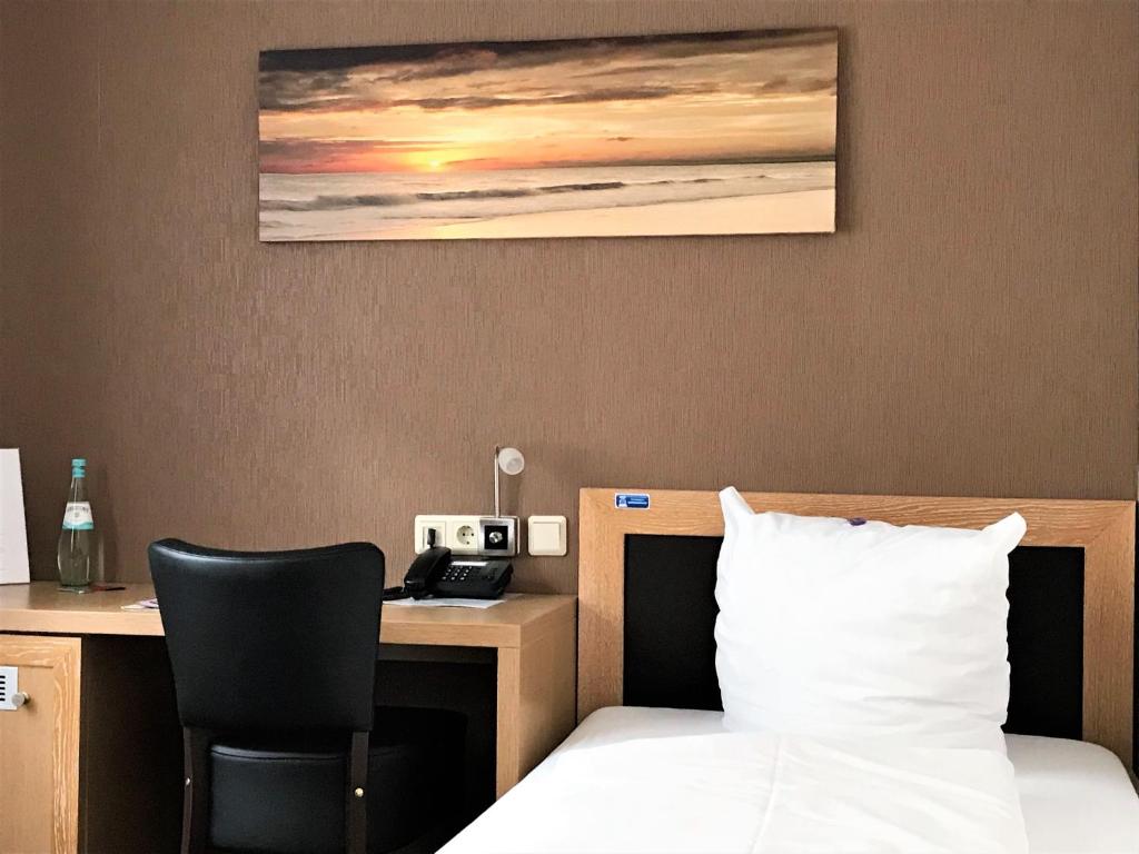 Voodi või voodid majutusasutuse Hotel Mühlhäuser Hof toas
