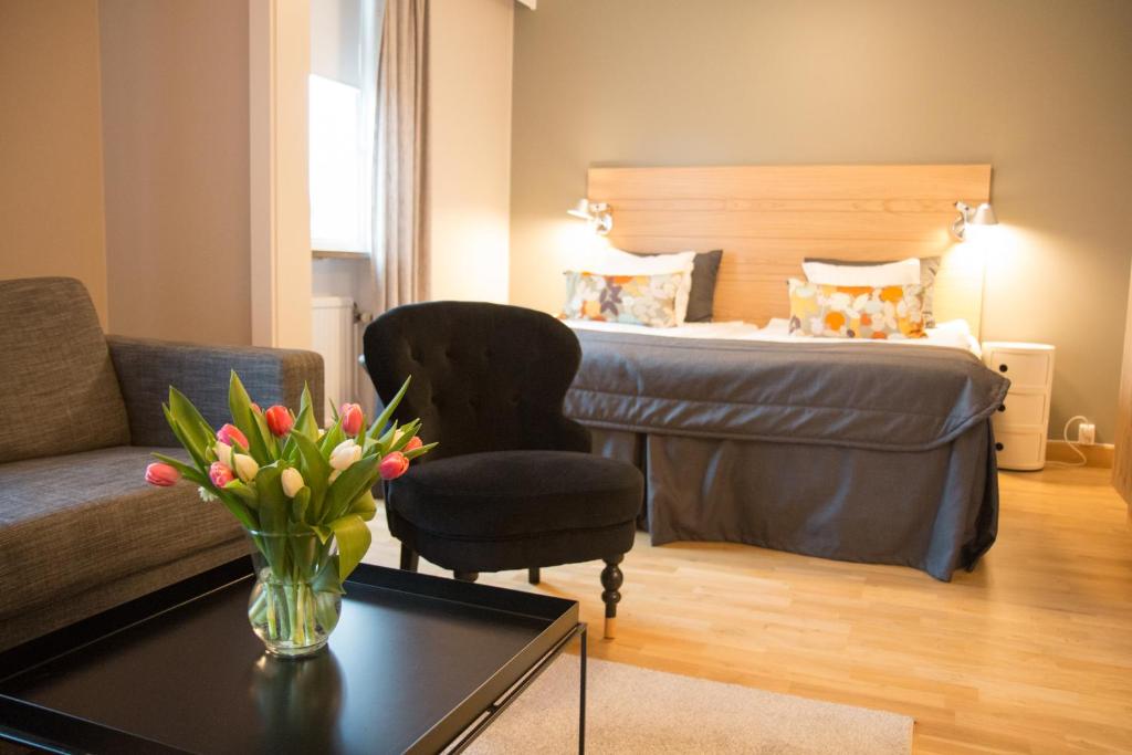 Postel nebo postele na pokoji v ubytování Hotell Aston