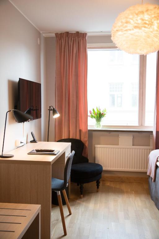 Postel nebo postele na pokoji v ubytování Hotell Aston