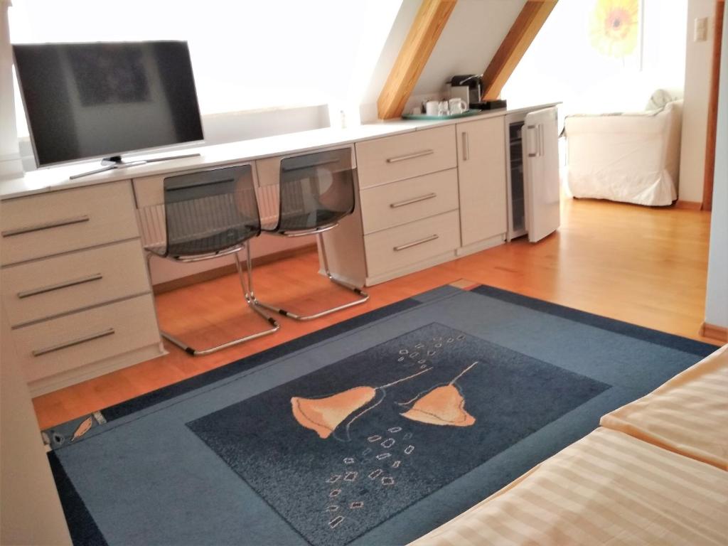 TV a/nebo společenská místnost v ubytování Villa Le Lux