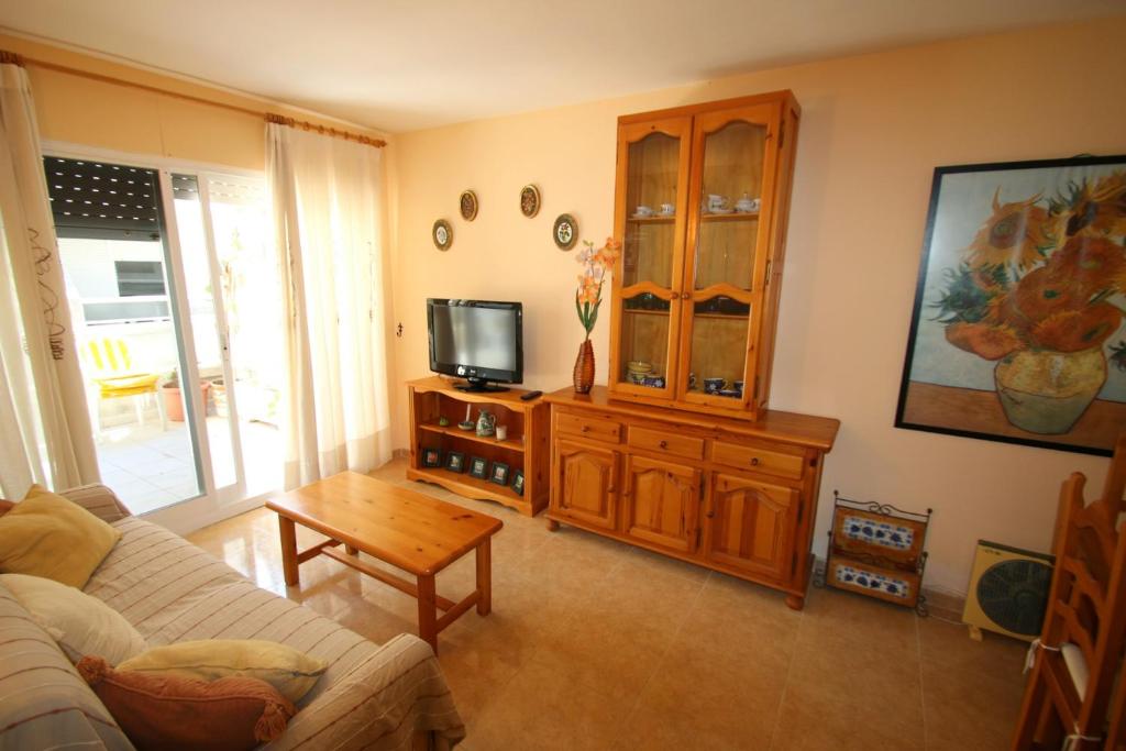A television and/or entertainment centre at Villa Adriana 209