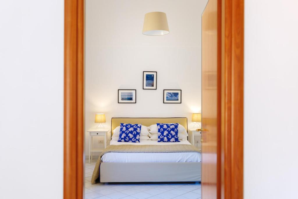 Postel nebo postele na pokoji v ubytování Casa Assunta B&B