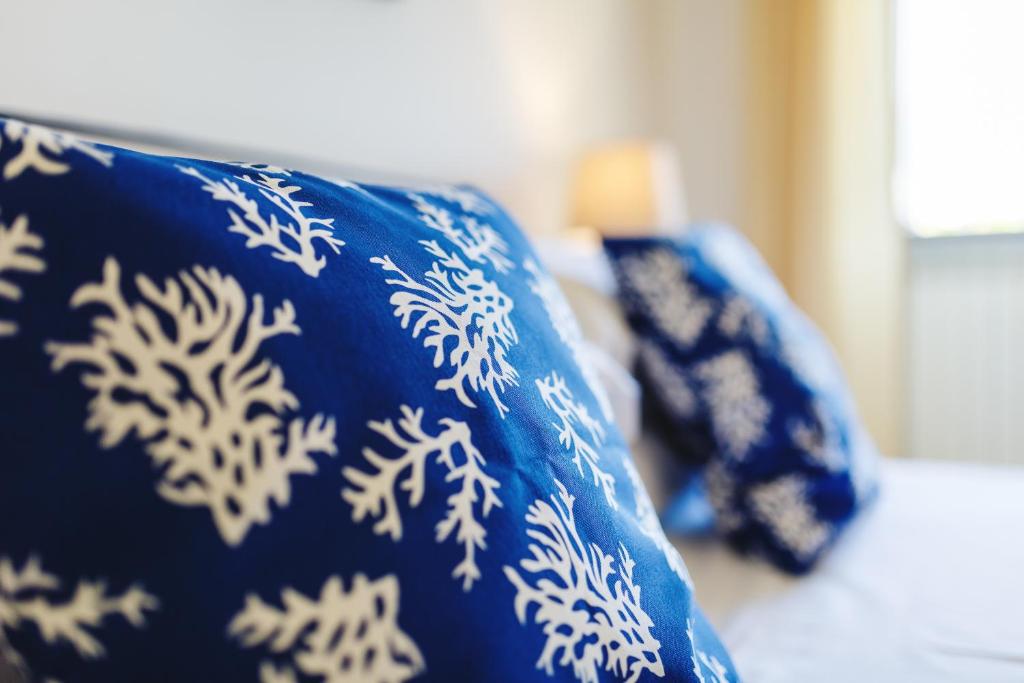 Postel nebo postele na pokoji v ubytování Casa Assunta B&B
