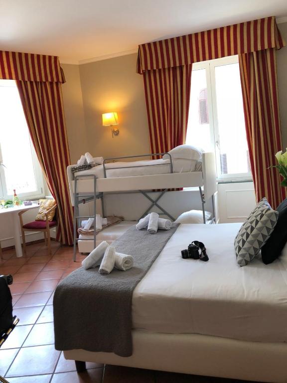 A bed or beds in a room at 207 Inn