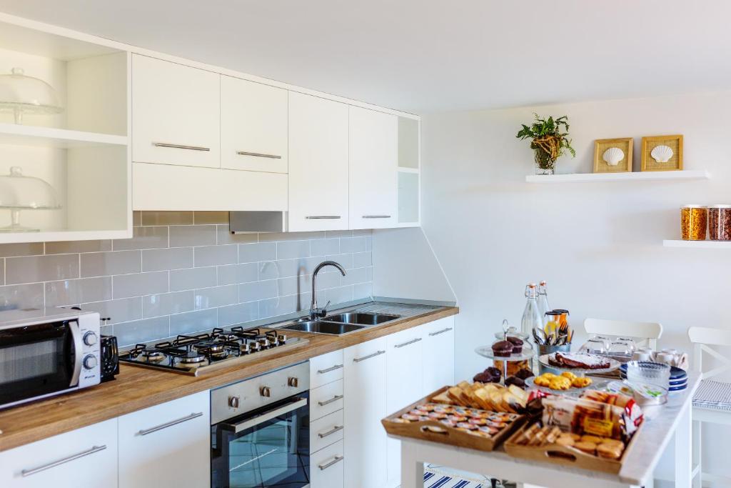 Kuchyň nebo kuchyňský kout v ubytování Casa Assunta B&B