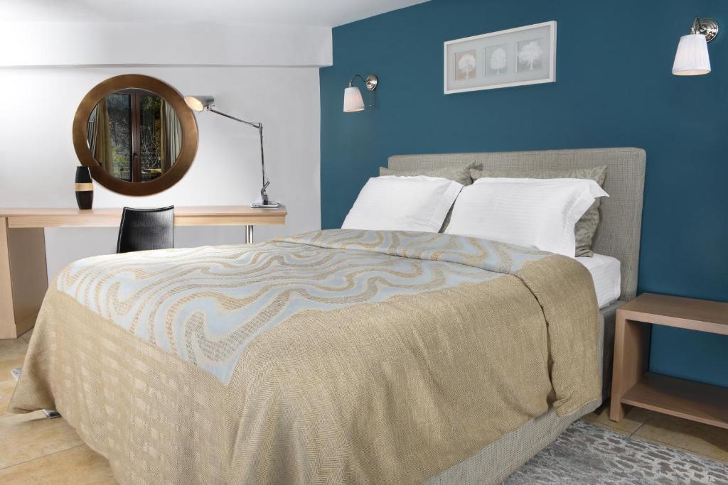 Postel nebo postele na pokoji v ubytování Forest Suites Boutique Hotel