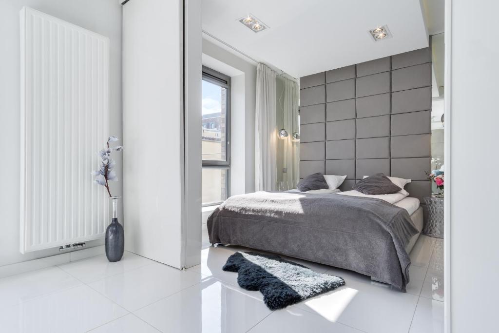Posteľ alebo postele v izbe v ubytovaní Elite Apartments Prestige Old Town