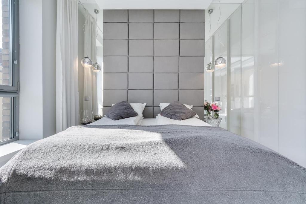 Posteľ alebo postele v izbe v ubytovaní Elite Apartments Prestige Old Town