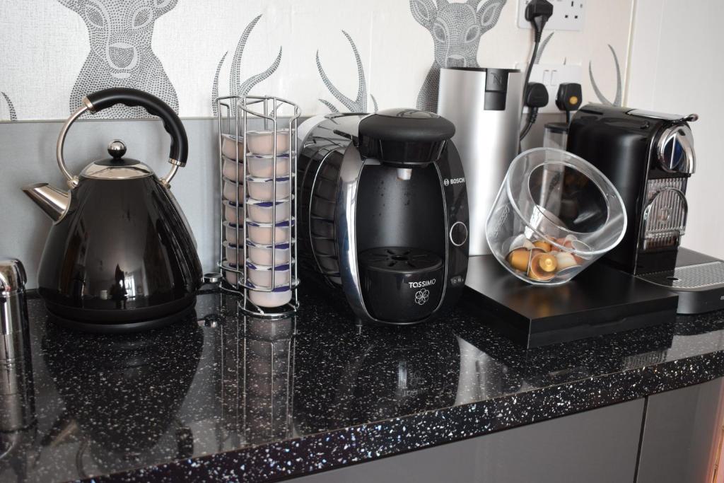 Set per la preparazione di tè e caffè presso The Tables Guest House