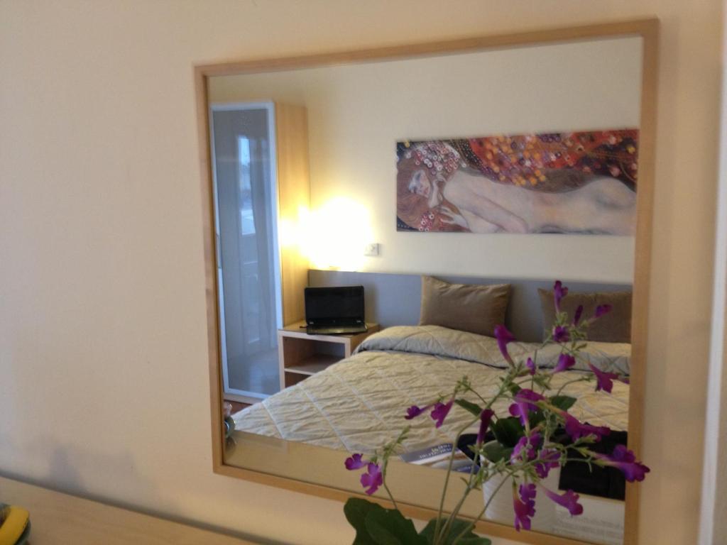 Postel nebo postele na pokoji v ubytování Hotel Indicatore