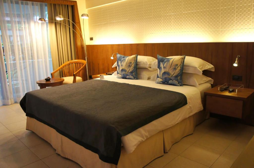 Postel nebo postele na pokoji v ubytování Safari Beach Hotel Patong