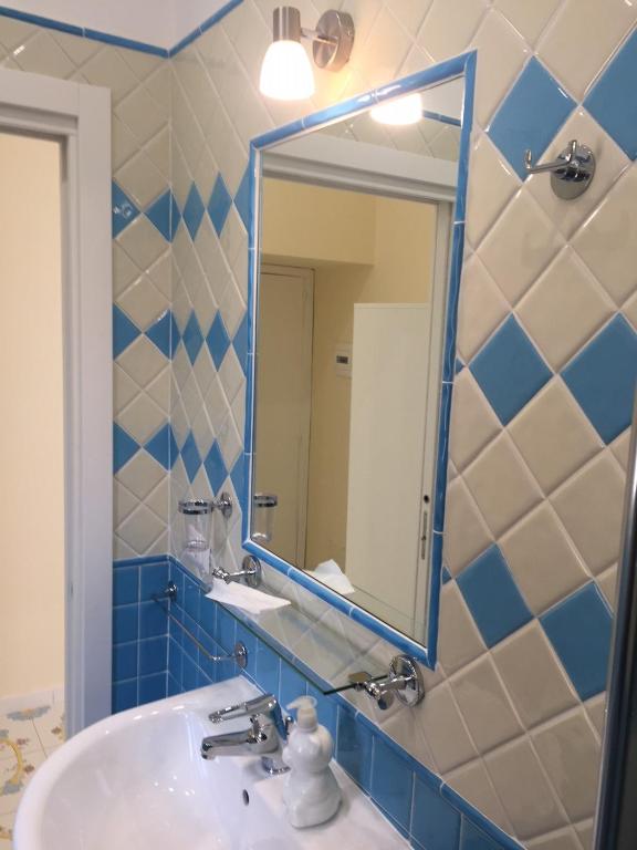 Koupelna v ubytování Albergo Oasi