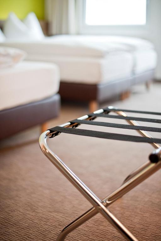 Postel nebo postele na pokoji v ubytování Basic Hotel Innsbruck