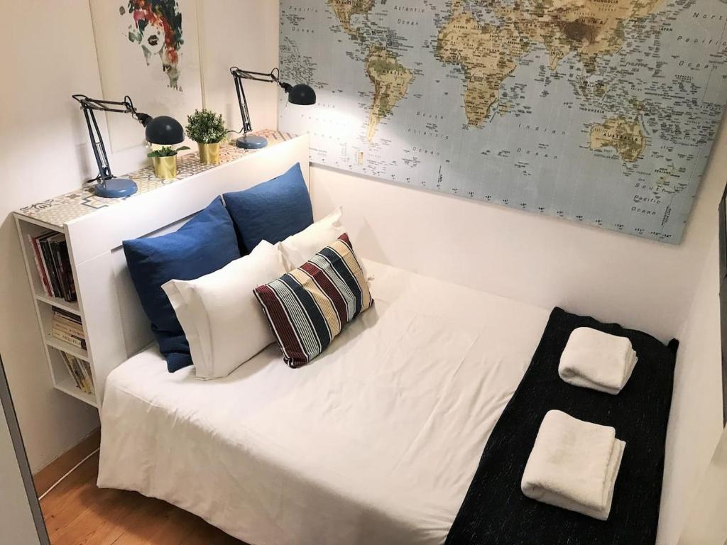 Llit o llits en una habitació de Cozy flat in prime location! Auto check-in