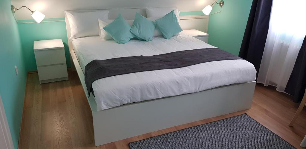 Posteľ alebo postele v izbe v ubytovaní Joy Guesthouse