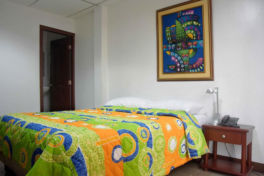 Postel nebo postele na pokoji v ubytování Hotel de Alborada