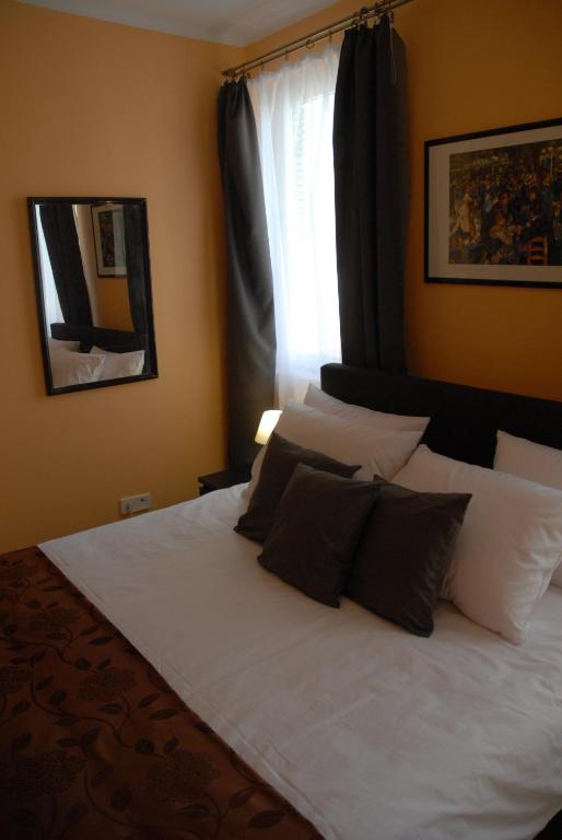 Posteľ alebo postele v izbe v ubytovaní Joy Guesthouse