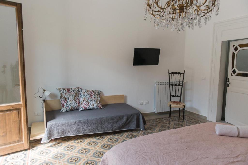 Posteľ alebo postele v izbe v ubytovaní B&B Malvasia