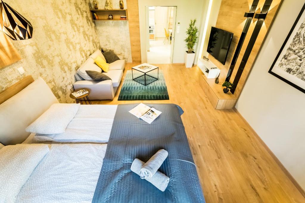Posteľ alebo postele v izbe v ubytovaní BpR Pixies Design Home