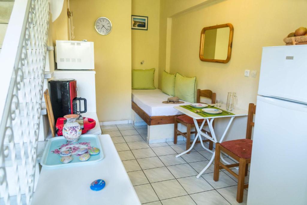 Kuchyň nebo kuchyňský kout v ubytování Stathopoulos Apartments