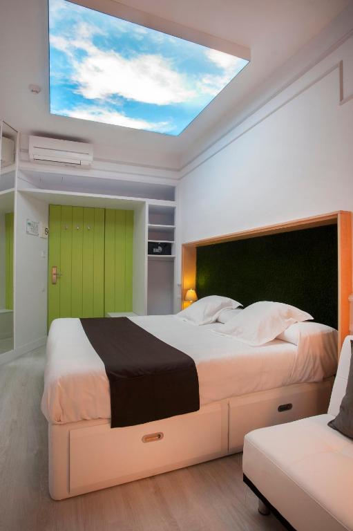 Posteľ alebo postele v izbe v ubytovaní Hotel Ribes Roges