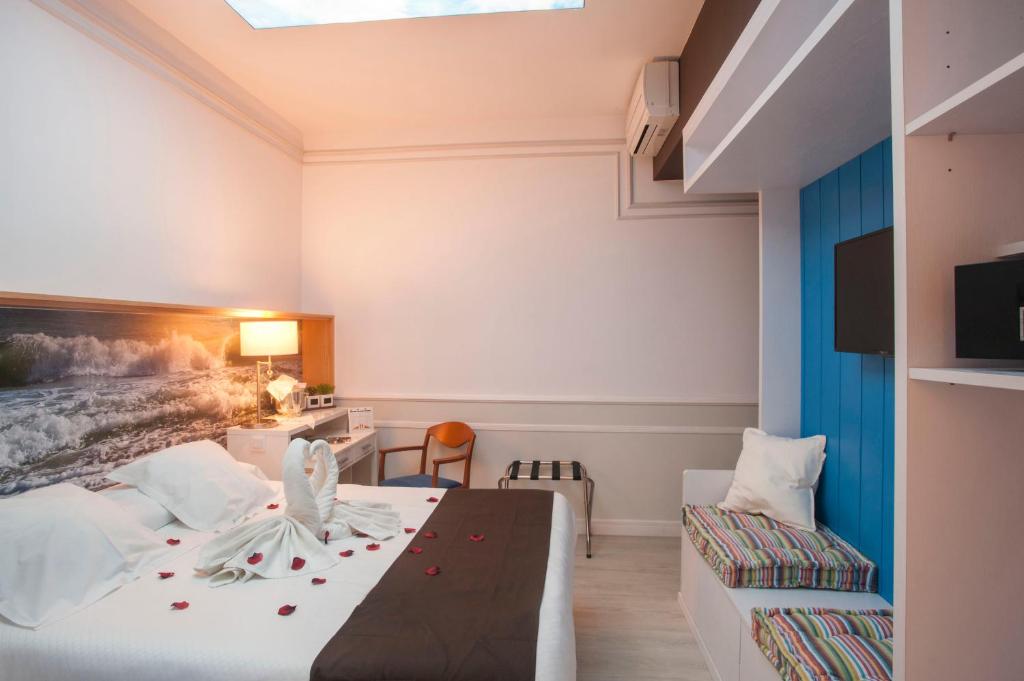 Posteľ alebo postele v izbe v ubytovaní Hotel Ribes Roges