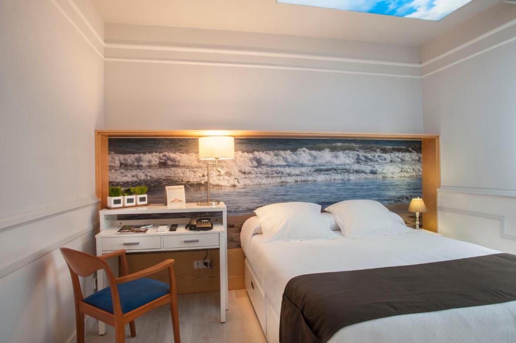 Posteľ alebo postele v izbe v ubytovaní Hotel Ribes Roges