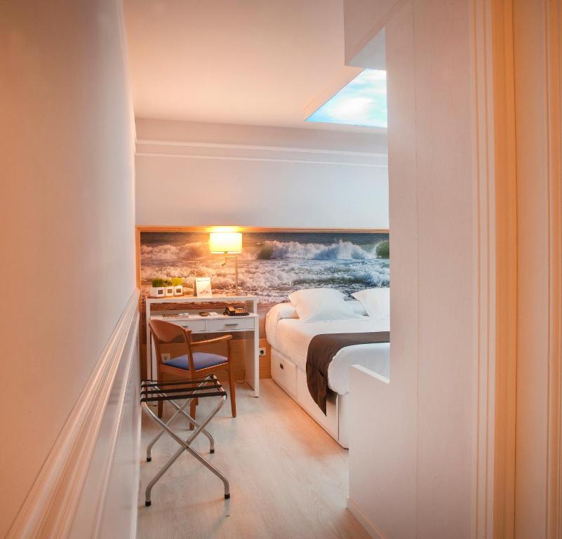 Posteľ alebo postele v izbe v ubytovaní Hotel Ribes Roges