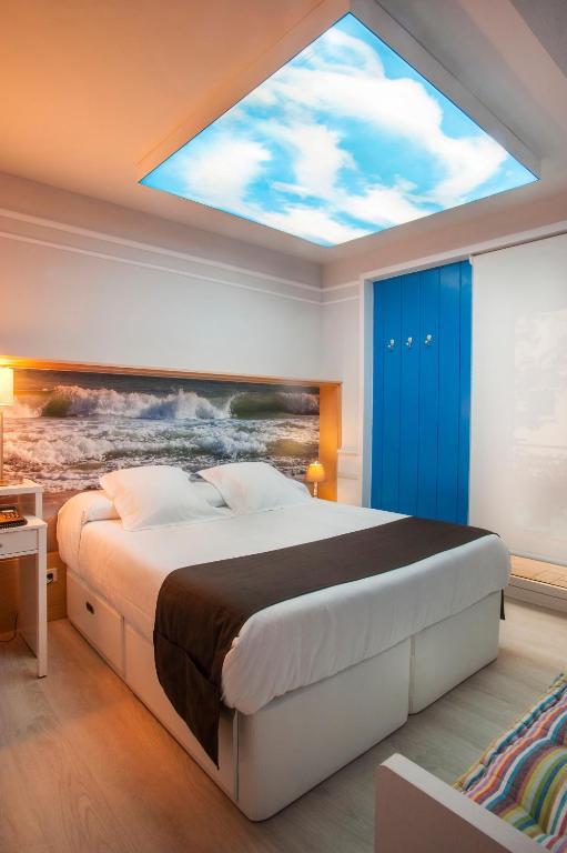 Posteľ alebo postele v izbe v ubytovaní Hotel Ribes Roges