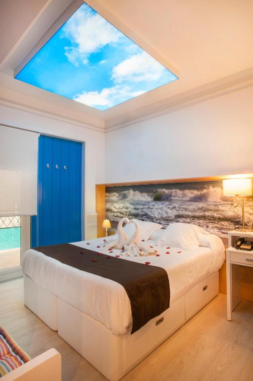 Posteľ alebo postele v izbe v ubytovaní Hotel Ribes Roges