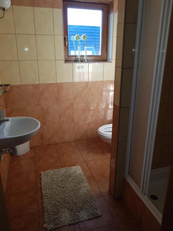 Kúpeľňa v ubytovaní RAJSKA PRZYSTAŃ