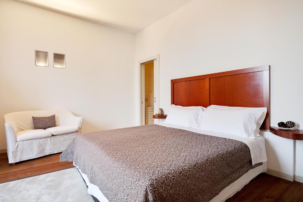 Postel nebo postele na pokoji v ubytování Hotel Due Mori