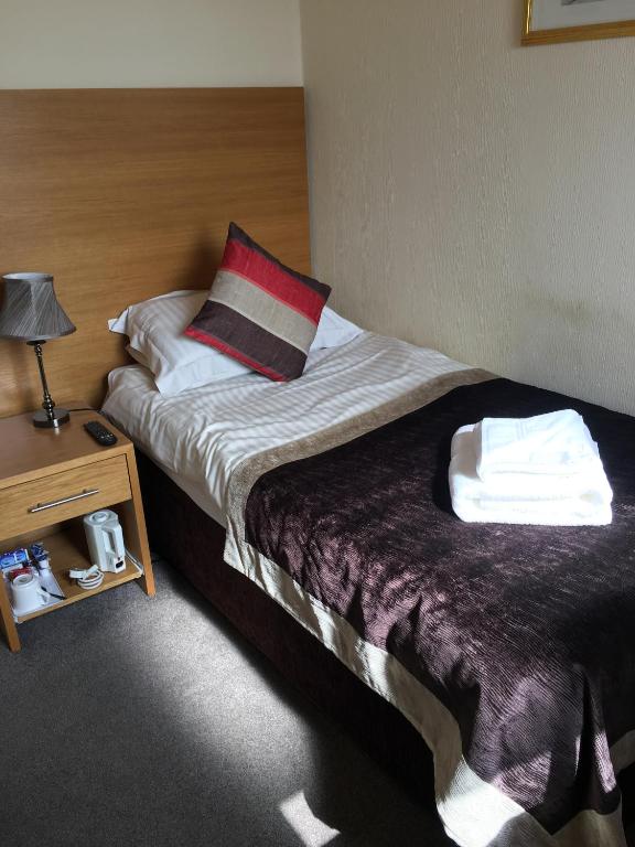 Postel nebo postele na pokoji v ubytování Belvedere Guest House