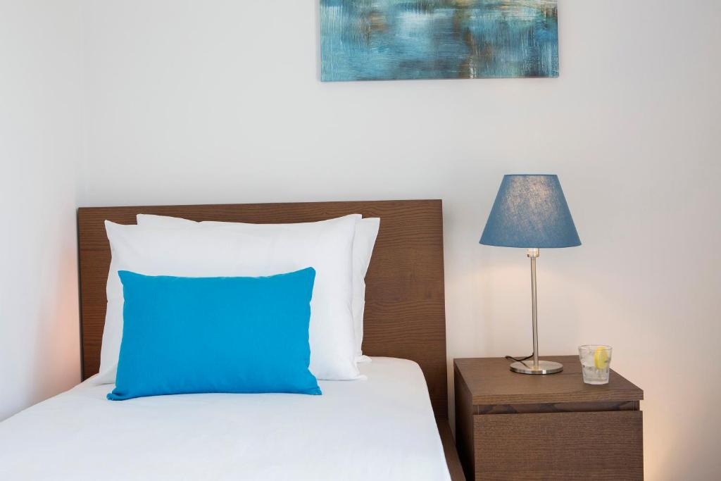 Postel nebo postele na pokoji v ubytování Alegria Boutique Villas