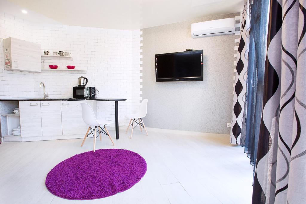 Kuchyň nebo kuchyňský kout v ubytování Sumskaya ApartHotel