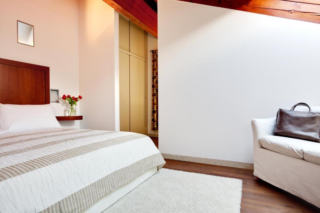 Postel nebo postele na pokoji v ubytování Hotel Due Mori