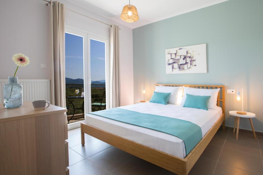 Postel nebo postele na pokoji v ubytování Alegria Boutique Villas