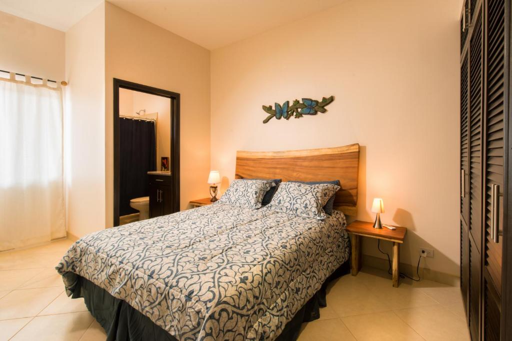 Säng eller sängar i ett rum på Cabo Velas Estates 30