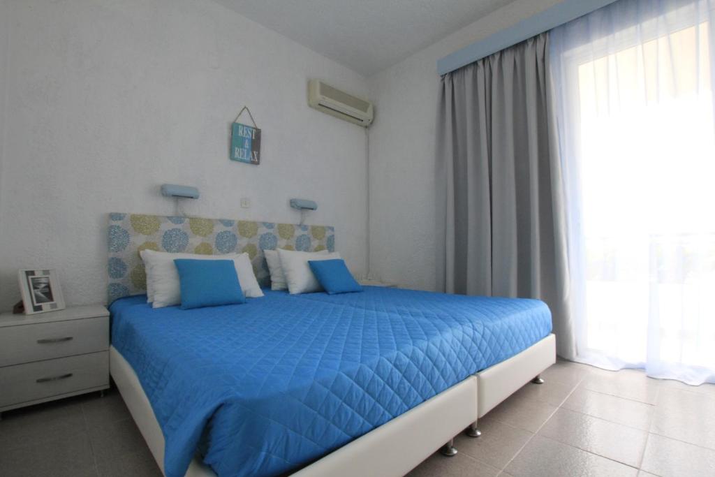 Postel nebo postele na pokoji v ubytování Christiana Hotel Apartments