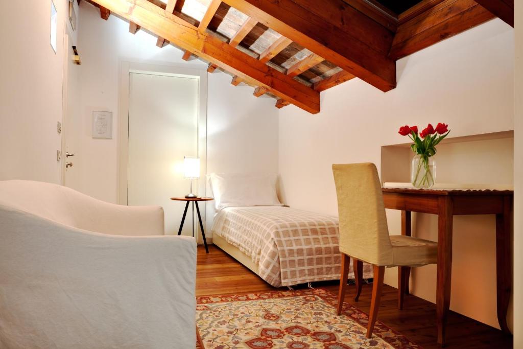 Postel nebo postele na pokoji v ubytování Hotel Due Mori