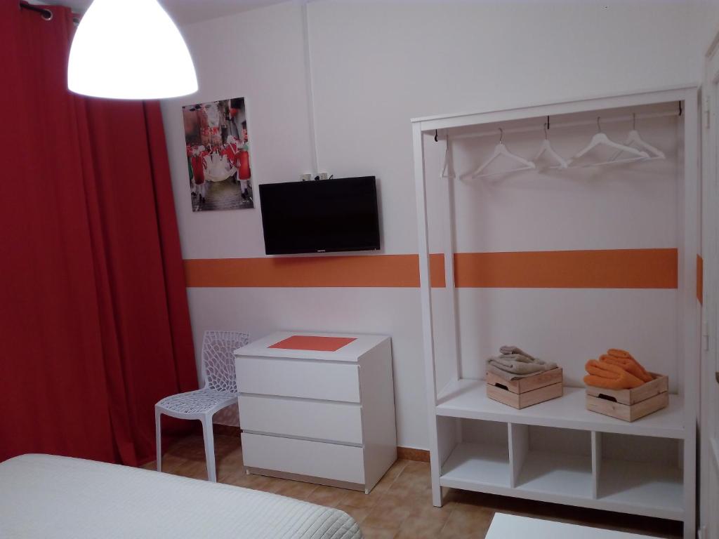 TV a/nebo společenská místnost v ubytování Ivrea la Bella