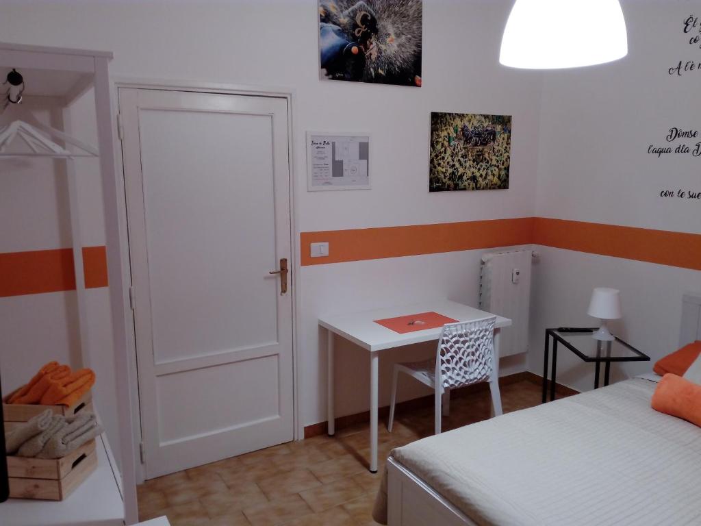 Postel nebo postele na pokoji v ubytování Ivrea la Bella