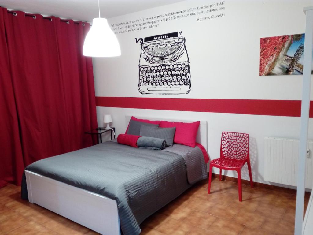 Postel nebo postele na pokoji v ubytování Ivrea la Bella